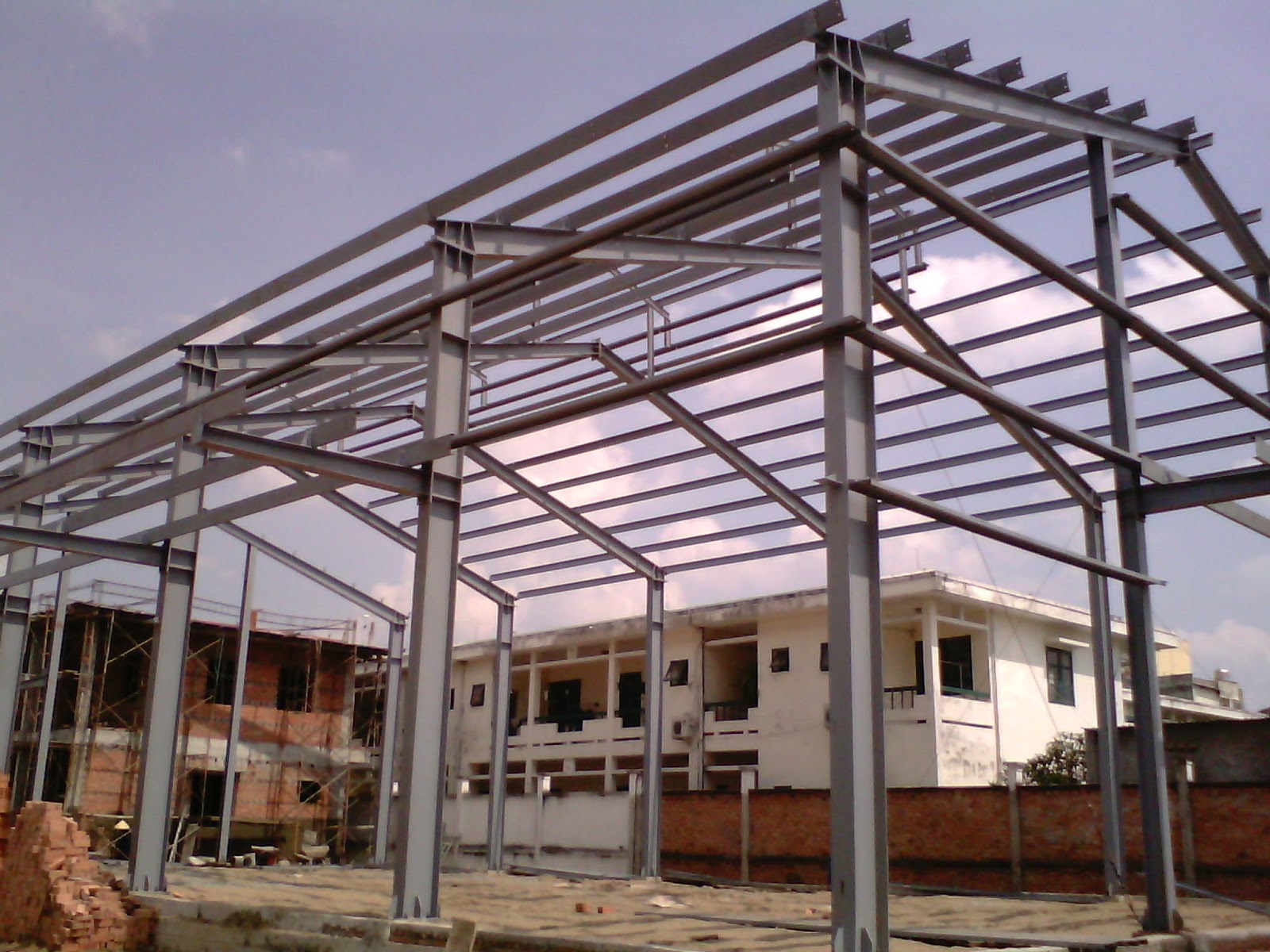 What is the pre-engineered steel building frame?