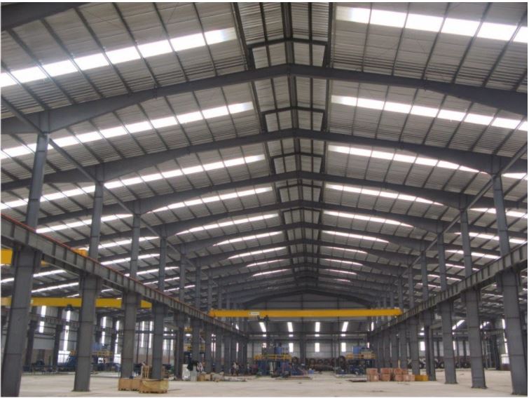 Pre-engineered steel buildings with corrugated sheet metal roofs