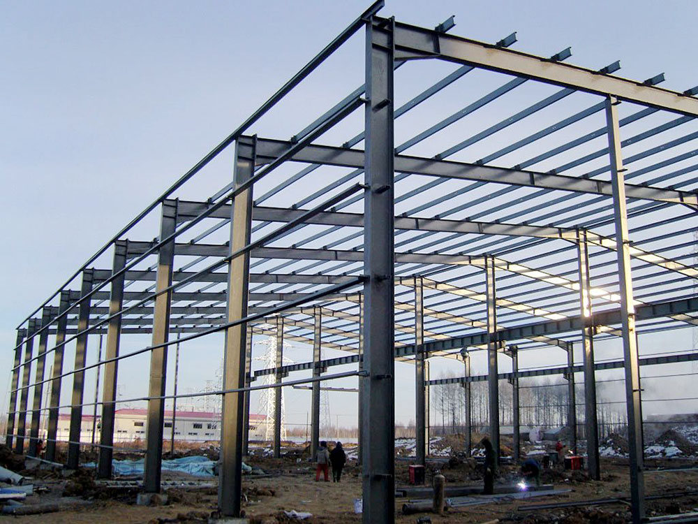 What is a load-bearing steel frame structure?